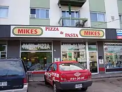 An urban Mikes location with previous logo