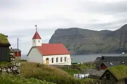 Mikladalur Church, looking across to the island of Kunoy