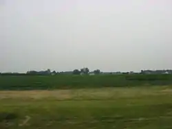 Fields and houses in Milan Township