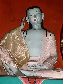 A statue of Milarepa.