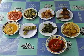 Padang cuisine served in a beach stall in Gandoriah Beach, Pariaman. Dishes in coastal areas of West Sumatra are mostly sea produce, such as fishes and prawns.