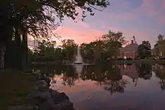 View of the pond in Mindowaskin Park in summer evening