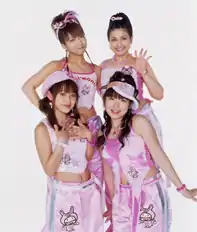 Mini-Moni, promoting "Lucky Cha Cha Cha!", 2003. From L to R: Nozomi Tsuji, Mika, Ai Takahashi and Ai Kago