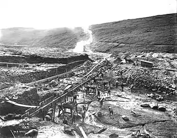 Sluicing operation on Anvil Creek ca. 1900