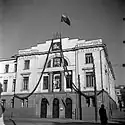 Ministry of Finance of Lithuania with portraits of Antanas Smetona, Vytautas the Great, Vytis (Waykimas) and the Columns of Gediminas in Kaunas, 1930.