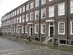 A row of brick-built terraced houses