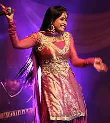 Miss Pooja performing in August 2009