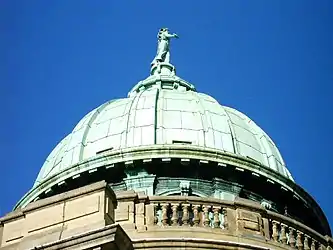 The ornate bronze dome roof