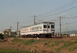 A KiHa-20 passenger train between Kurashiki-shi and Kyūjōmae stations