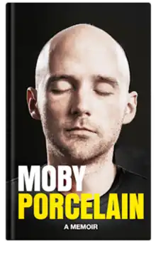 Moby's face on a black background