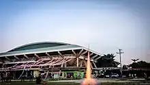 A model rocket being launched outdoors