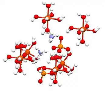Unit cell of ferrous ammonium sulfate (N is violet, O is red, S is orange, Fe is large red).