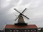 Windmill of Piet (folly which serves as landmark in the local "Van Blanckendaell Park" zoo)