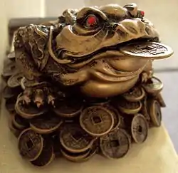 A money-frog resin sculpture