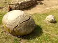 The carved boulder