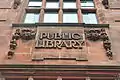 Public Library Sign on the outside of the building