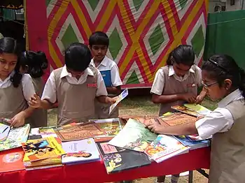 Children browsing books.