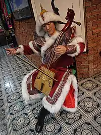 An ethnic Mongol Chinese musician performing Inner Mongolian style morin khuur