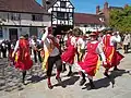 English dancers wearing Morris folk dancing outfits