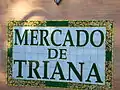 Mosaic sign for the Triana Market