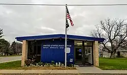 one-story brick building with sign "United States Post Office, Motley, Minnesota 56466"