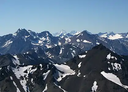 Image 15The Coast Mountains are heavily eroded by glaciers, including Mount Waddington (far background, center). (from Geology of the Pacific Northwest)