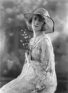 young white woman in large white hat