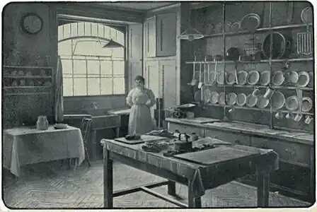 Kitchen with a housekeeper, 1907