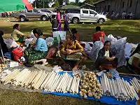 Sale of bamboo sticks with glutinous rice
