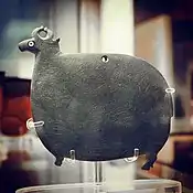 Mudstone palette in the form of a bull, with inlaid shell eyes Predynastic, Naqada I 4000-3600 BC EA 20910 (British Museum)