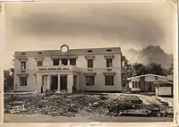 Tubao Municipal Building (the Moncada Model), under construction in the early 1960s during the incumbency of Mayor Florencio Baltazar, Sr. The building was destroyed during the July 16, 1990, earthquake.