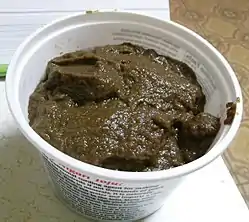 Mushroom ketchup in a plastic tub