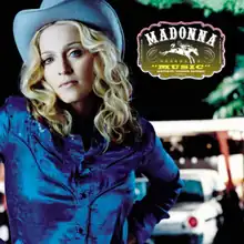 A woman wearing a blue cowboy outfit, with a blue cowboy hat. On the right, a box in the shape of a cowboy buckle contains the text: Madonna, Music, Maverick/Warner Bros.