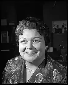 Black and white head and shoulders portrait photograph of Guerin in western clothes