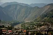 Heightened view of the city on both riverbanks after the 2005 Kashmir earthquake, c. 2014