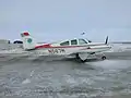 BE33 (N567M) at Cambridge Bay Airport Nunavut, Canada