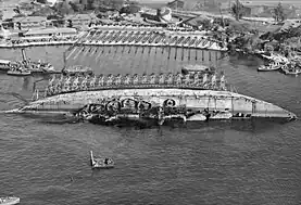 USS Oklahoma salvage from shore 19 March 1943