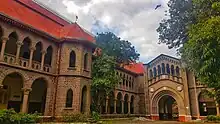 building of the college with a huge gateway