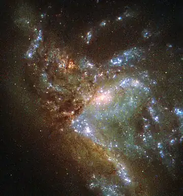 Galaxy NGC 6052 merging into a single structure.