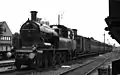 NS 6015 with a train in Hilversum. (June 1935)