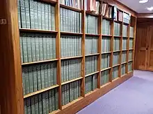 Bookshelves holding 280 volumes of the National Union Catalog (NUC)