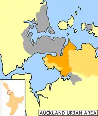 Manukau City (in orange) within the Auckland metropolitan area. The darker orange indicates the urban area.