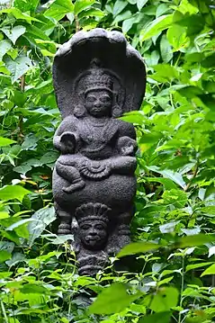 Nagaraja under a Saptarna Tree