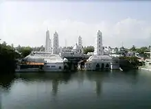 A panoramic view of Nagore Dargah; Dome, Sacred water tank and the five minarets