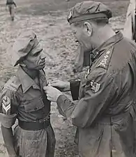 Naik Narayan Sinde receives the Indian Distinguished Service Medal from General Sir Claude Auchinleck, 1945