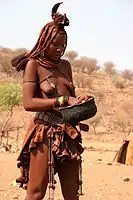 Himba woman working, Namibia