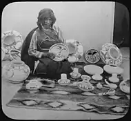 Iris Nampeyo, world-famous Hopi ceramist, with her work, c. 1900, photo by Henry Peabody