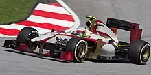 Narain Karthikeyan driving for HRT at the 2012 Malaysian Grand Prix.