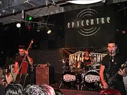 Nekromantix performing in 2011. L-R: Nekroman, Lux, Mesa
