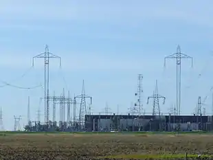 Nelson River Bipoles 1 and 2 terminate at Dorsey Converter Station near Rosser, Manitoba. The station takes HVDC current and converts it to HVAC current for re-distribution to consumers